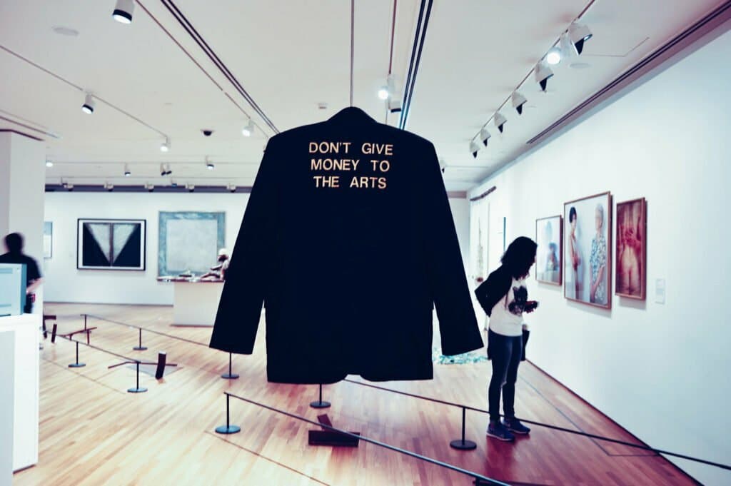A fashion start-up showing a jacket in a museum.