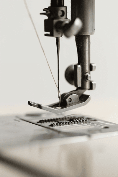 A sewing machine is used to create a fashion brand.