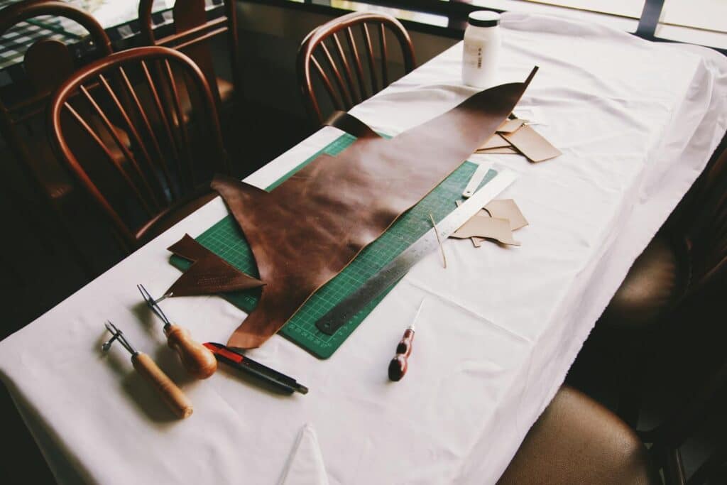 Brown Leather Textile on Top of Drafting Board