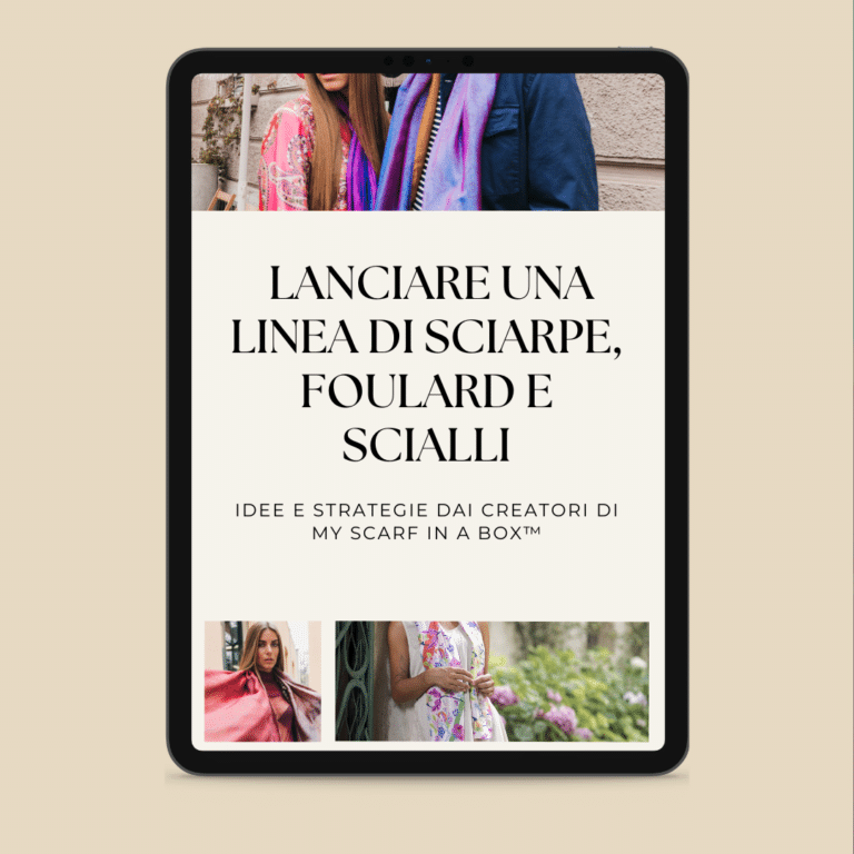 Une tablette montrant une page web en italien sur le lancement d'une ligne de foulards, avec des photos de femmes portant différents foulards.