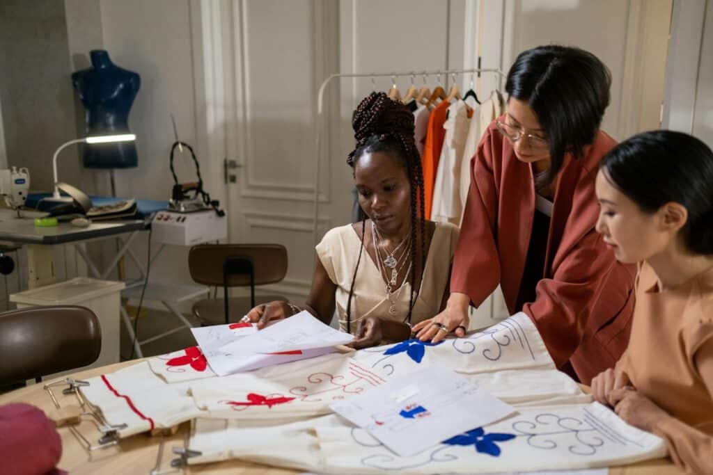 Women Looking at Projects in Atelier