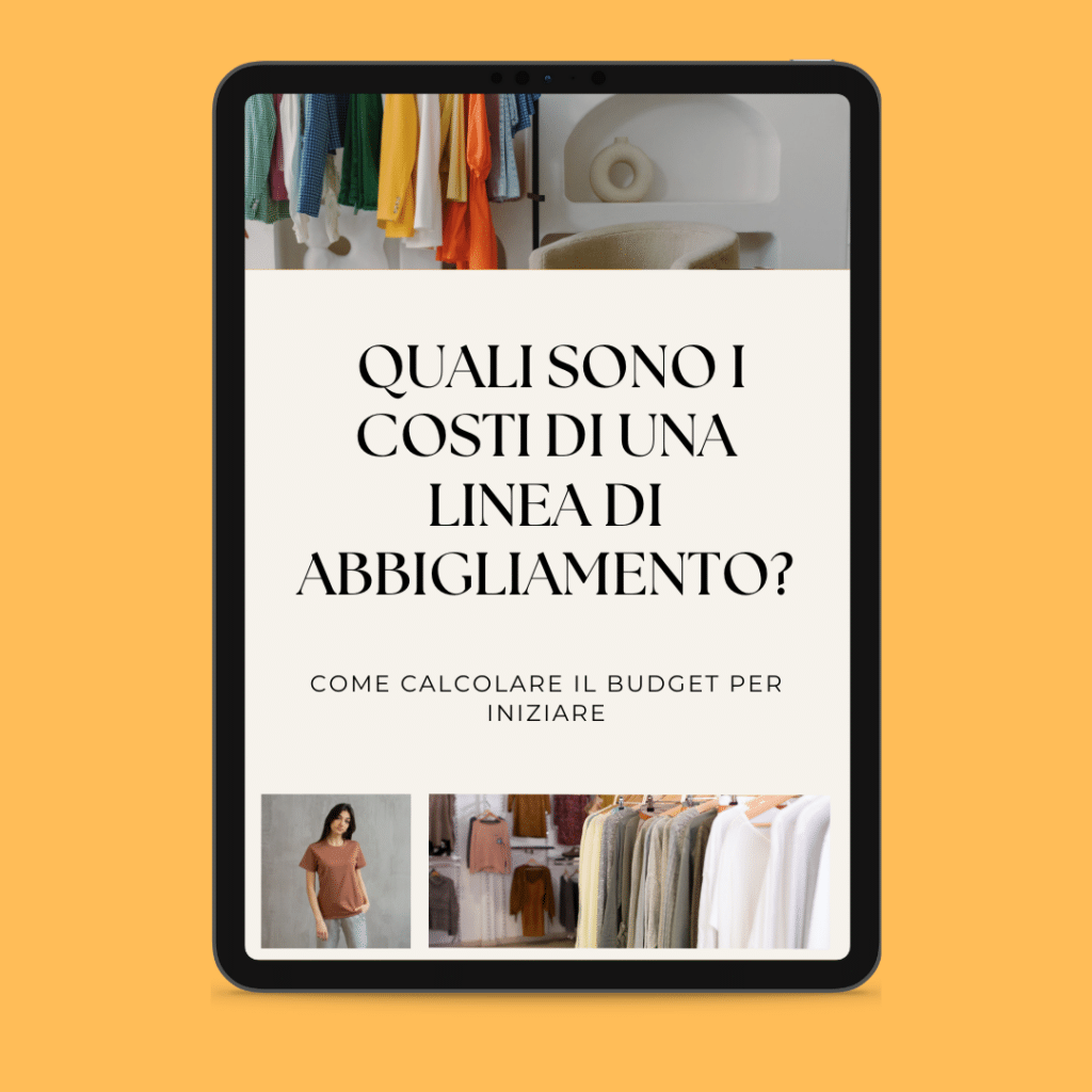 Une tablette affiche un article intitulé "Combien coûte le lancement d'une marque de vêtements ?", enrichi de photos de vêtements et de tissus, offrant un aperçu des dépenses liées au lancement d'une ligne de mode.